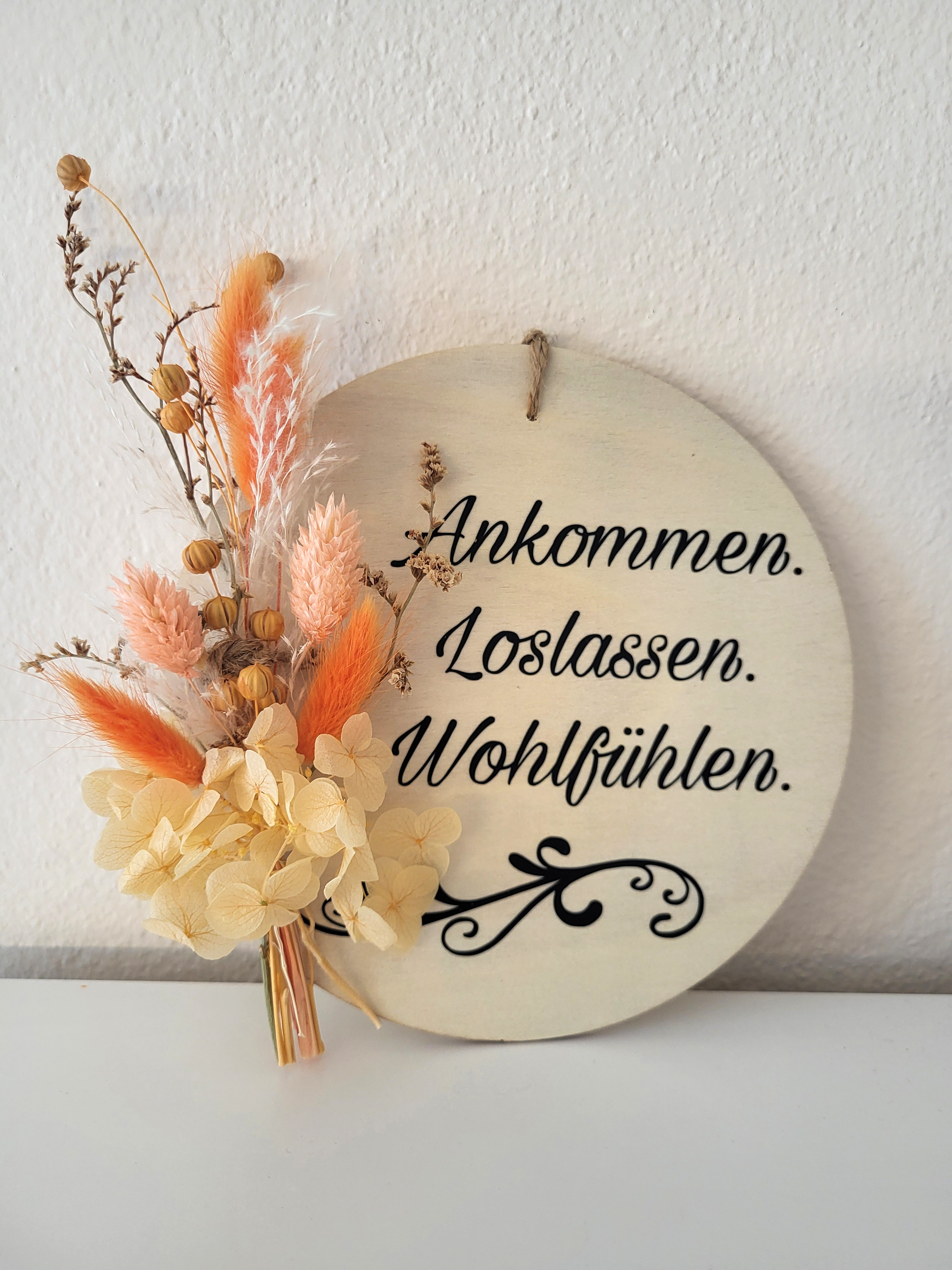 Holzschild mit Spruch